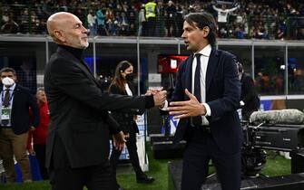MILAN, ITALY - APRIL 19: Stefano Pioli Head Coach of AC Milan and Simone Inzaghi Head Coach of FC Internazionale are seen before the Coppa Italia Semi Final 2nd Leg match between FC Internazionale v AC Milan at Giuseppe Meazza Stadium on April 19, 2022 in Milan, Italy. (Photo by Mattia Ozbot - Inter/Inter via Getty Images)