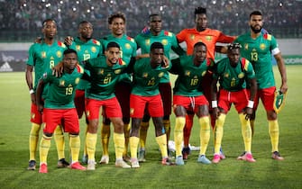 epa09859603 Cameroon players pose for a team photo before the FIFA Qatar 2022 World Cup Africa qualifiers match between Algeria and Cameroon at Mustapha Tchaker Stadium de Blida, Algeria, 29 March 2022.  EPA/STR