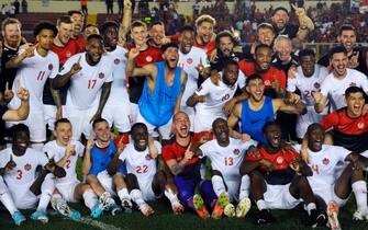 CIUDAD DE PANAMA, PANAMA - MARCH 30: Tajon Buchanan, Cyle Larin,  Jonathan Osorio, Junior Hoilett of Canada and teammates celebrate qualifying to Qatar 2022 after a match between Panama and Canada as part of Concacaf 2022 FIFA World Cup Qualifiers at Rommel Fernandez Stadium on March 30, 2022 in Ciudad de Panama, Panama. (Photo by Guillermo Legaria/Getty Images)