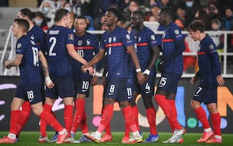 France's players celebrate a goal during the FIFA World Cup Qatar 2022 qualification Group D football match between Finland and France at the Olympic Stadium in Helsinki, on November 16, 2021. (Photo by FRANCK FIFE / AFP) (Photo by FRANCK FIFE/AFP via Getty Images)