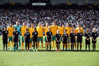 AUCKLAND, NEW ZEALAND - SEPTEMBER 25: Australia sings the national anthem  during the International friendly match between the New Zealand All Whites and Australia Socceroos at Eden Park on September 25, 2022 in Auckland, New Zealand. (Photo by Fiona Goodall/Getty Images)