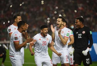 Players of Tunisia sing national anthem during the second leg of the 2022 Qatar World Cup African Qualifiers football match between Tunisia and Mali at the Hamadi Agrebi Olympic stadium in the city of Rades. Final score First Match; Tunisia 1:0 Mali, Second Match; Tunisia 0:0 Mali. (Photo by Jdidi Wassim / SOPA Images/Sipa USA)