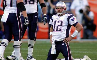 New England quarterback Tom Brady looks on after an incomplete pass late in the fourth quarter against the Denver Broncos at Invesco Field in Denver, CO on October 16, 2005.   Brady failed to rally the  Patriots losing to the Broncos 28-20.  (UPI Photo/Gary C. Caskey)