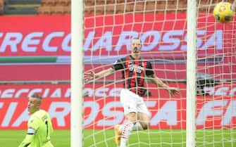 AC Milan s Zlatan Ibrahimovic (L) scores goal of 1 to 0 against Crotone's goalkeeper Alex Cordaz during the Italian serie A soccer match between AC Milan and Fc Crotone at Giuseppe Meazza stadium in Milan, 7 February  2021.
ANSA / MATTEO BAZZI