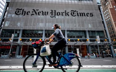 The New York Times building is seen on June 30, 2020 in New York City. - The New York Times has become the highest-profile media organization to leave Apple News, saying the tech giant's service was not helping achieve the newspaper's subscription and business goals. The daily's exit comes as news organizations around the world struggle with declining print readership and an online environment where ad revenue is dominated by Google and Facebook. (Photo by Johannes EISELE / AFP) (Photo by JOHANNES EISELE/AFP via Getty Images)