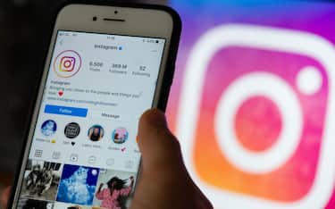 A user on Instagram social network in L'Aquila, Italy, on October 3, 2020. Today Facebook's program Instagram turns ten years from his launch. (Photo Illustration by Lorenzo Di Cola/NurPhoto via Getty Images)