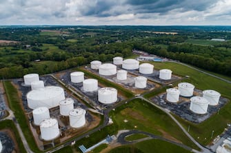 epa09185947 An image made with a drone shows fuel tanks at a Colonial Pipeline breakout station in Woodbine, Maryland, USA, 08 May 2021. A cyberattack forced the shutdown of 5,500 miles of Colonial Pipeline's sprawling interstate system, which carries gasoline and jet fuel from Texas to New York.  EPA/JIM LO SCALZO