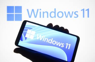UKRAINE - 2021/06/24: In this photo illustration a Windows 11 logo is seen on a smartphone and a pc screen in the background.
Microsoft has presented Windows 11, new generation of Windows operating system (OS), during an event on June 24, 2021. (Photo Illustration by Pavlo Gonchar/SOPA Images/LightRocket via Getty Images)