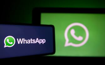 FRANCE SOCIAL MEDIA WHATSAPP epa08967944 A photo illustration shows the logo of social media messaging application Whatsapp on a computer and a mobile telephone screen, in Paris, France, 27 January 2021. The popular application (app) Whatsapp has faced backlash after announcing on 04 January a change to its privacy policy under which users widely interpreted that personal information would be shared with the app's parent company, Facebook. Although the policy change allegedly was only to affect interactions with business accounts, it prompted millions of users to migrate to rival messaging applications such as Signal and Telegram. EPA/IAN LANGSDON