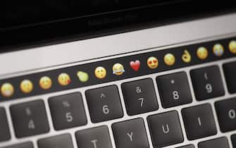 CUPERTINO, CA - OCTOBER 27: Emoticons are displayed on the Touch Bar on a new Apple MacBook Pro laptop during a product launch event on October 27, 2016 in Cupertino, California. Apple Inc. unveiled the latest iterations of its MacBook Pro line of laptops and TV app. (Photo by Stephen Lam/Getty Images)