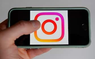 The logo of the App instagram is on the display of an iPhone 6, Germany, city of Osterode, 17. May 2016. Photo: Frank May | usage worldwide