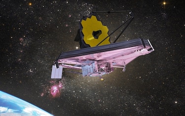 James Webb Space Telescope looking at galaxies. This image elements furnished by NASA https://www.nasa.gov/image-feature/goddard/2017/hubble-catches-starbursts-in-a-barred-spiral-galaxy