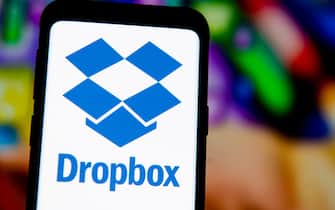 POLAND - 2020/03/23: In this photo illustration a Dropbox logo seen on a smartphone.  (Photo Illustration by Mateusz Slodkowski / SOPA Images / LightRocket via Getty Images)