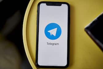 The Telegram logo on a smartphone arranged in the Brooklyn Borough of New York, U.S., on Tuesday, Oct. 5, 2021. Signal and Telegram, two private messenger apps, saw downloads and user sign-ups soar during the extended downtime of Facebook Inc.s network of apps and services. Photographer: Gabby Jones/Bloomberg via Getty Images