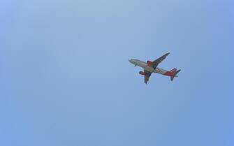 Aereo Easyjet Plane in flight over Naples, Italy