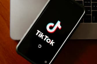 epa10351125 The Tiktok application logo is pictured on a smartphone in Taipei, Taiwan, 06 December 2022. On 02 December, the The US Federal Bureau of Investigation (FBI) warned about Tiktok, that it presents national security concerns in regards to the integrity of the application's algorithm. On 05 December, a Ministry of Digital Affairs (MODA) official announced that the application have been deemed to be 'harmful product against national information security.'  EPA/RITCHIE B. TONGO