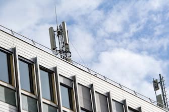 epa08823823 5G antennas are seen on the roofs of buildings in Bordeaux, France, 16 November 2020. The deployment of 5G in France will begin on 18 November 2020. Orange in leader, and SFR, Bouygues Telecom, Free Mobile have operating licenses and are granted on a basic basis for 15 years, with the possibility of extending them for fivee more years. The construction of the 5G network will take at least 10 years. It will switch to 100 percent 5G in 2030.  EPA/CB