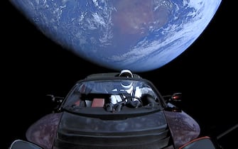 IN SPACE - FEBRUARY 8: In this handout photo provided by SpaceX, a Tesla roadster launched from the Falcon Heavy rocket with a dummy driver named "Starman"  heads towards Mars. (Photo by SpaceX via Getty Images)