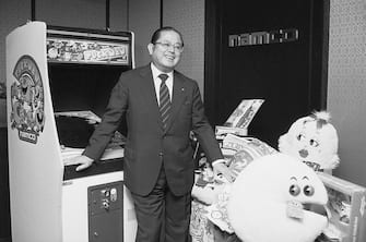 (Original Caption) Tokyo: The spirit of Christmas future is personified by Masaya Nakamura, founder of Namco Ltd. and father of Pac-Man (Puckman in Japan). He is widely credited with masterminding the video game craze. A home video version of Pac-Man is expected to be among this year's hottest Christmas items.