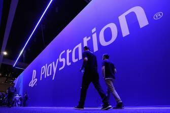 LOS ANGELES, CA - JUNE 13:  Game enthusiasts and industry personnel walk past the 'Sony Playstation' exhibit during the Electronic Entertainment Expo E3 at the Los Angeles Convention Center on June 13, 2017 in Los Angeles, California.  (Photo by Christian Petersen/Getty Images)