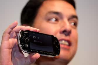 TOKYO - SEPTEMBER 02:  President of Sony Computer Entertainment Japan, Shawn Layden displays the new PlayStation Portable (PSP) "PSP-3000" at Conrad Tokyo on September 2, 2008 in Tokyo, Japan.  The new PSP is equipped with an advanced LCD, high resolution PSP display, capable of displaying movies and photos in more natural and vibrant colours. The new PSP will be on sale in October 2008.  (Photo by Koichi Kamoshida/Getty Images)