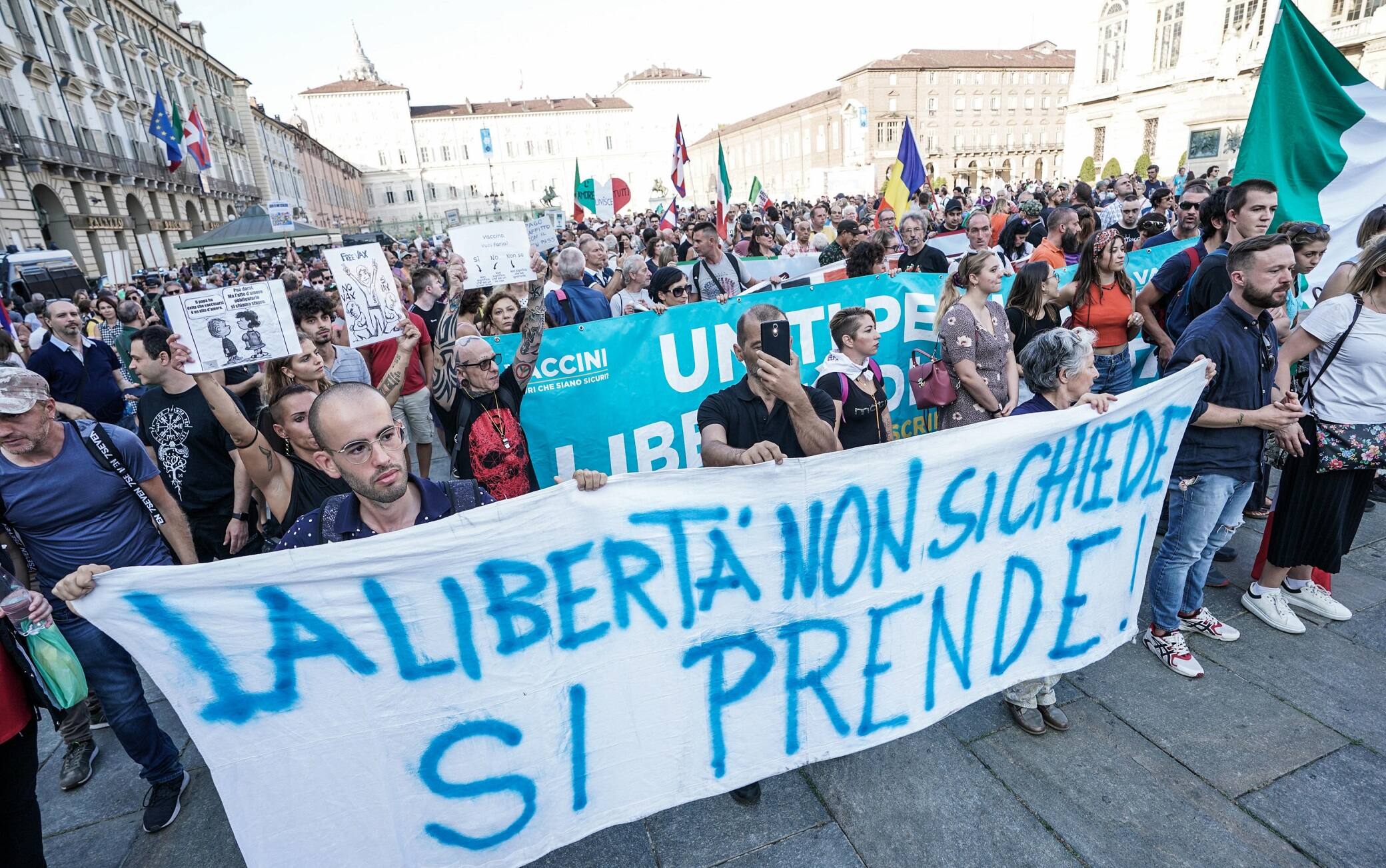A moment of the protest 'No green pass' in Turin, 11 September 2021. ANSA/TINO ROMANO