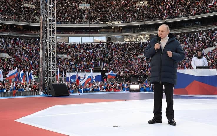 Vladimir Putin con indosso il parka di Loro Piana