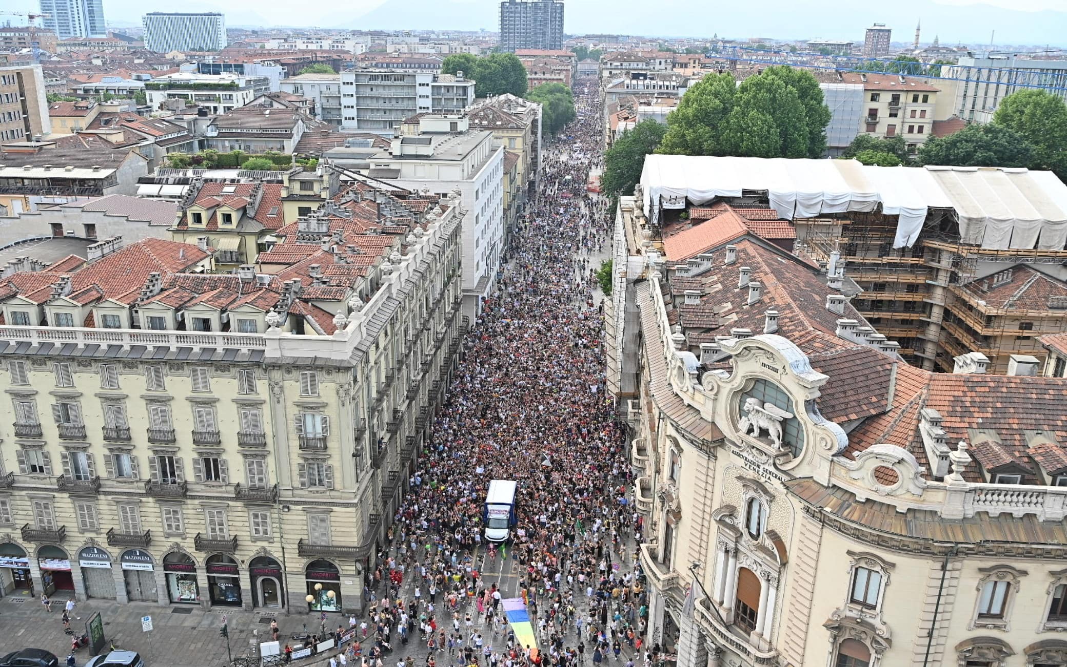 People attend the Turin Pride parade in Turin, Italy, 18 June 2022. Pride month is celebrated across the world every year in the month of June to raise awareness and promote equal rights for the LGBTQ community.  ANSA / Alessandro Di Marco