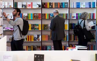 OVAL LINGOTTO, TURIN, ITALY - 2019/05/09: Visitors view books at 32nd Turin International Book Fair. Turin International Book Fair (Italian: Salone Internazionale del Libro) is Italy's largest trade fair for books, held annually in Turin. (Photo by NicolÃ² Campo/LightRocket via Getty Images)
