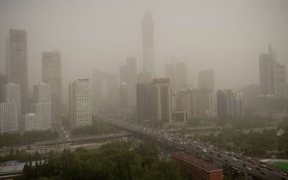 Tempesta di sabbia colpisce Pechino.FOTO