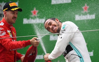 Sebastian Vettel e Lewis Hamilton sul podio
